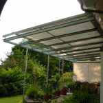 Vordach bietet Regen- und Sonnenschutz - Holzbauzenter